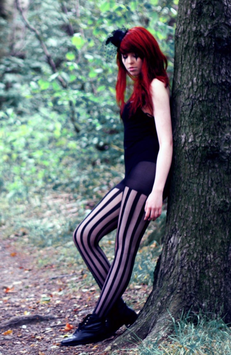 Redhead Gothic Girl wearing Black Sheer Patterned Pantyhose and Black Slip